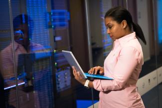 woman in front of computers